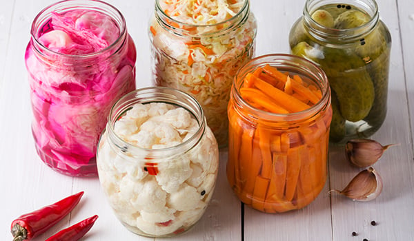 Eating pickled foods, like those pictured, can help keep your gut healthy.