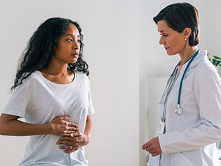 woman and doctor discussing gut health
