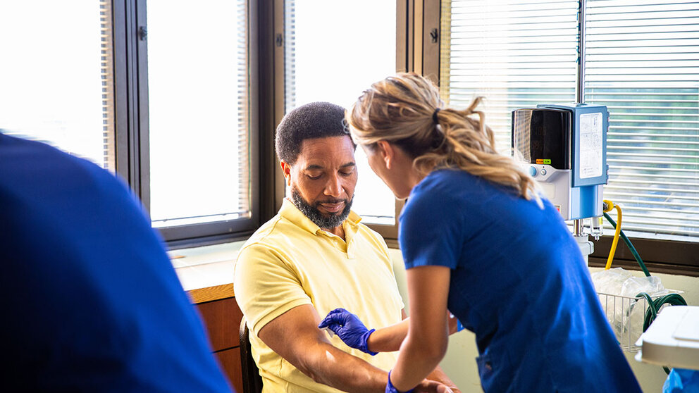 Man getting blood draw at clinic