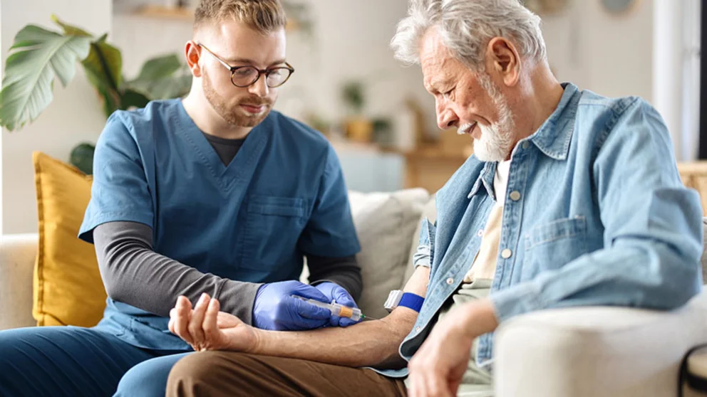 Older man getting blood draw