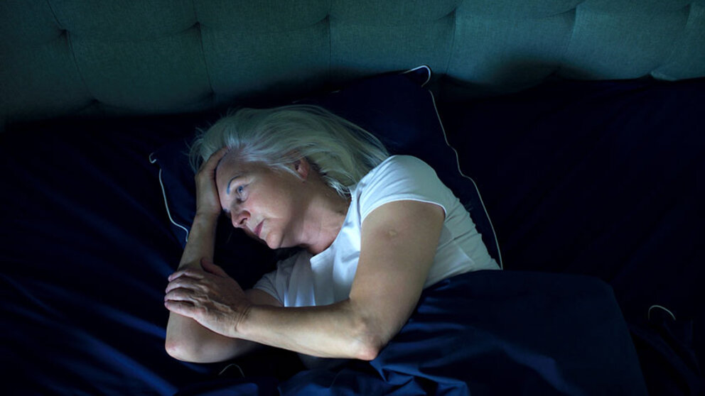 Woman trying to fall asleep