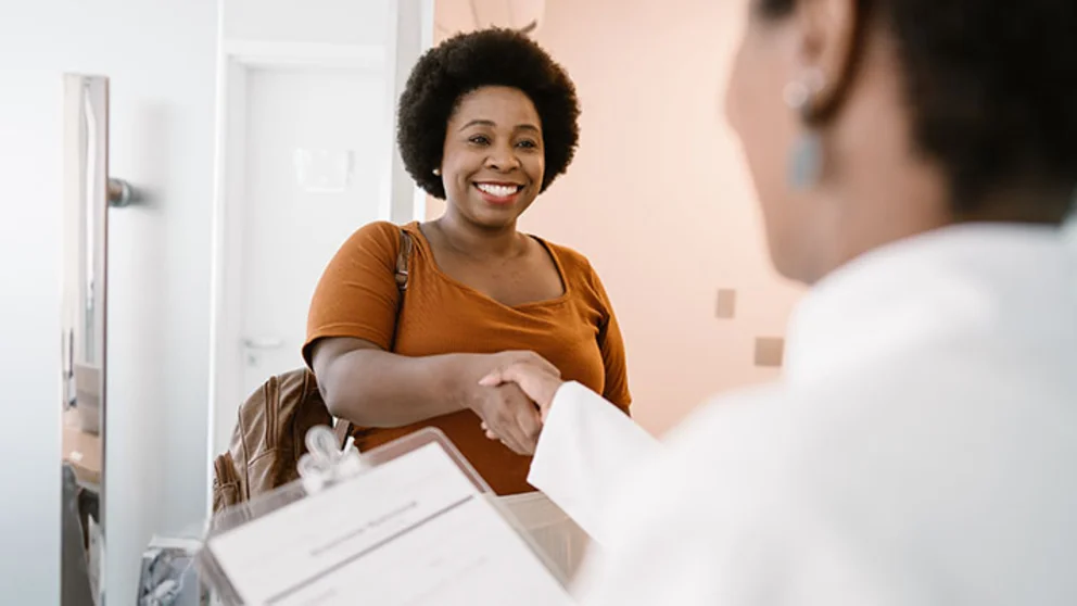 doctor speaking to patient