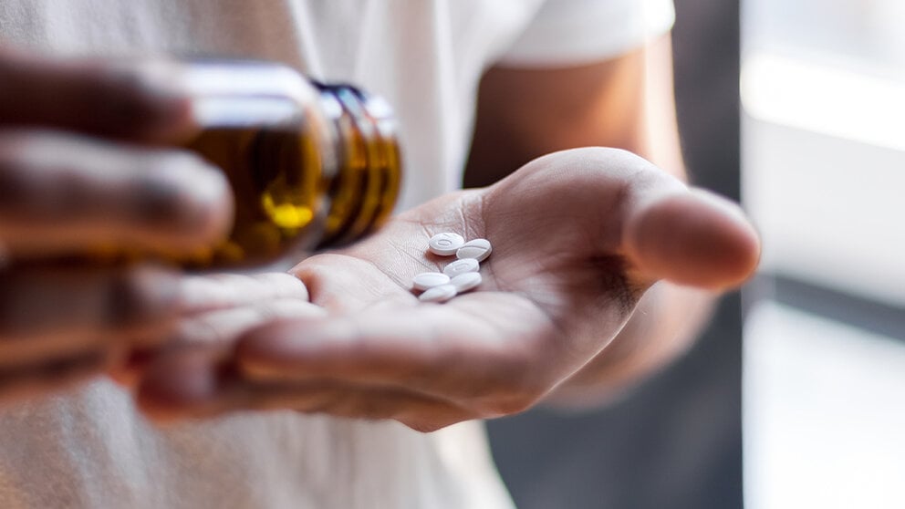 A woman taking supplements