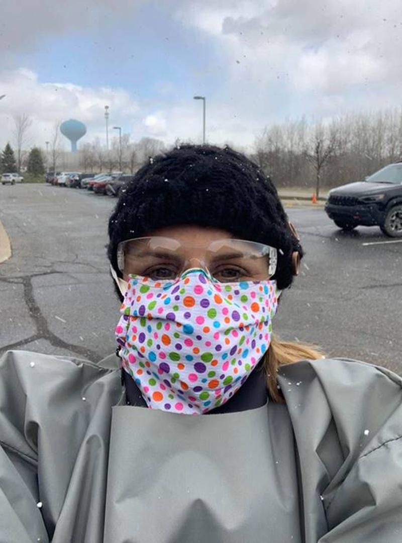 MDVIP affiliate Kathryn Hinderer, DO in Clarkston, MI, gears up for drive-by coronavirus testing at her primary care practice. 
