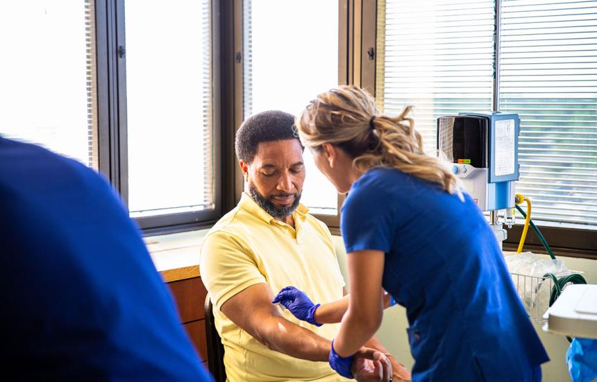 Man getting blood draw at clinic