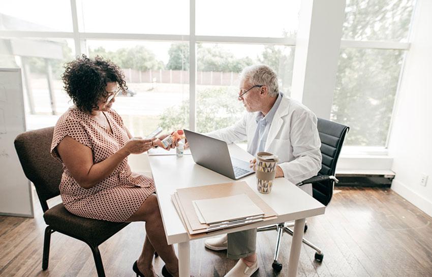 Patient talking to doctor about medications