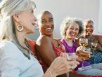 4 women drinking wine