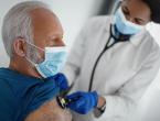 Elderly man having his heart checked by a doctor