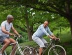 A couple cycling in a park