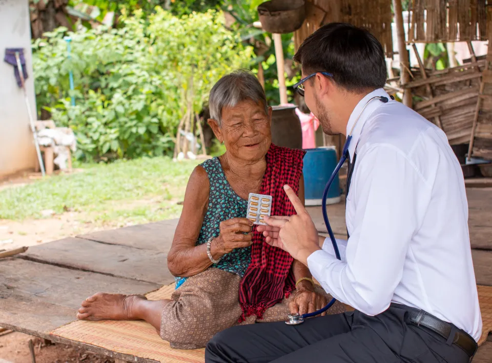 doctors supporting patient 