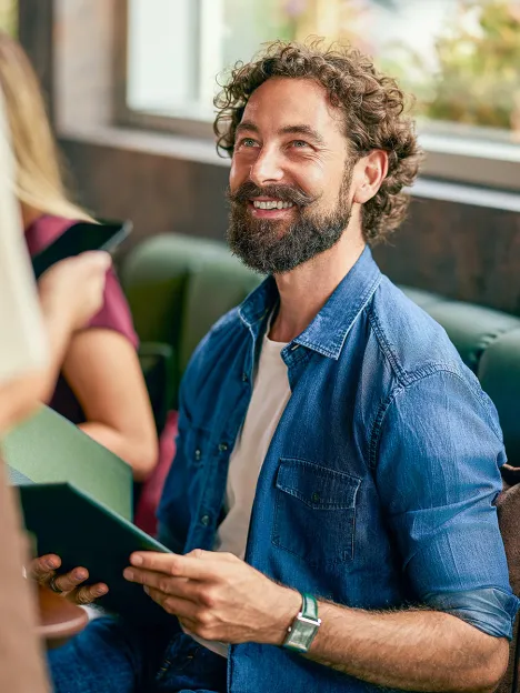 happy-man-talking-cozy-cafe-relaxed-friendly-atmosphere