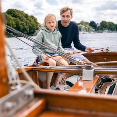 father-and-daughter-on-a-sailing-trip