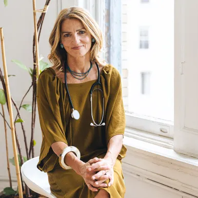 confident-female-doctor-sitting