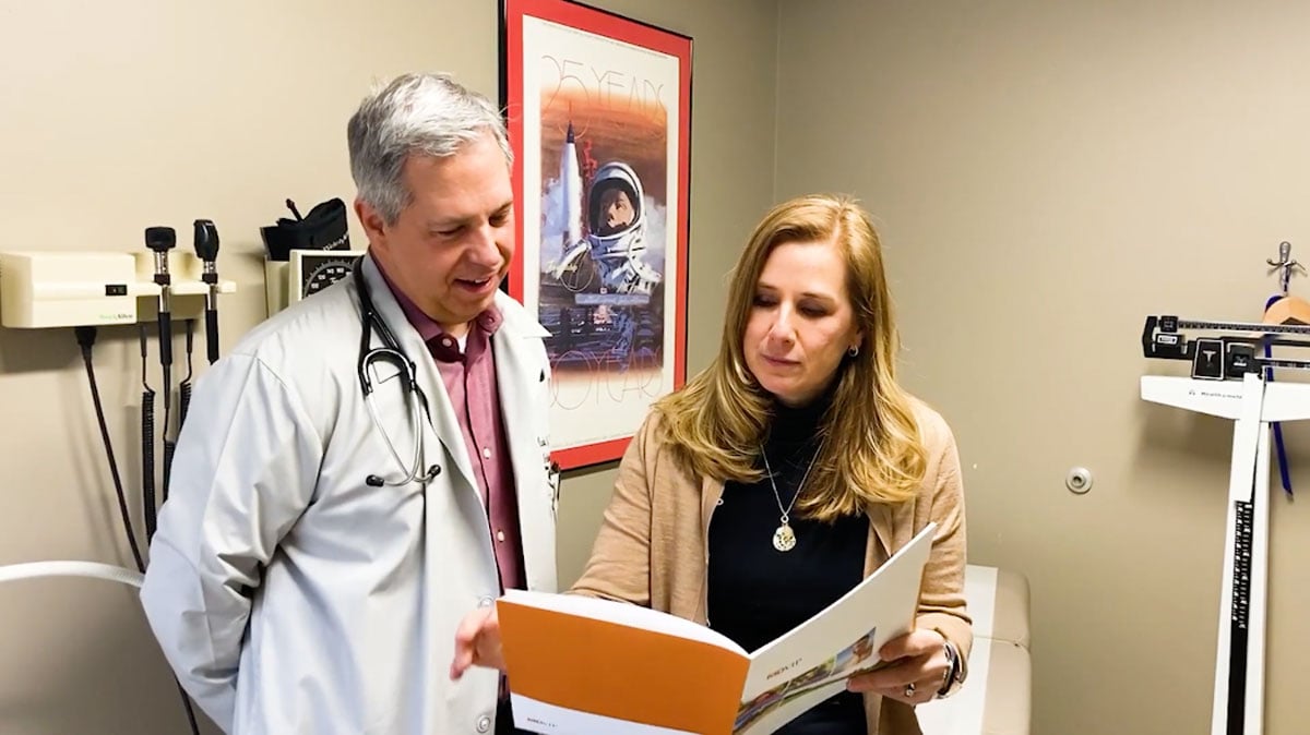 patient going over medical records with an MDVIP-affiliated physician